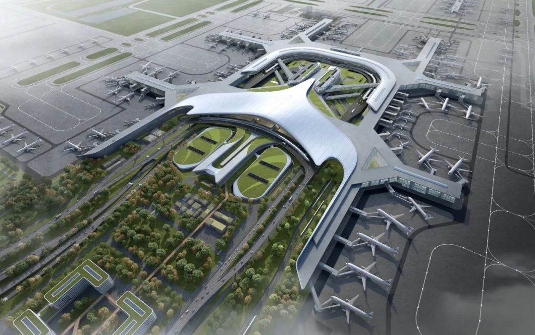 Vista a&eacute;rea de la terminal del aeropuerto con aviones en las puertas
